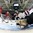 GRAND FORKS, NORTH DAKOTA - APRIL 14: Switzerland's Dominik Volejnicek #11and Latvia's Pauls Svars #12 battle in front of the net while Gustavs Grigals #29 looks to make a save during preliminary round action at the 2016 IIHF Ice Hockey U18 World Championship. (Photo by Matt Zambonin/HHOF-IIHF Images)

